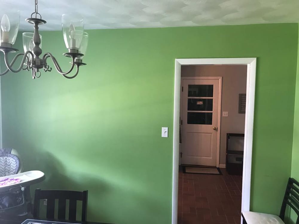 green wall in dining room