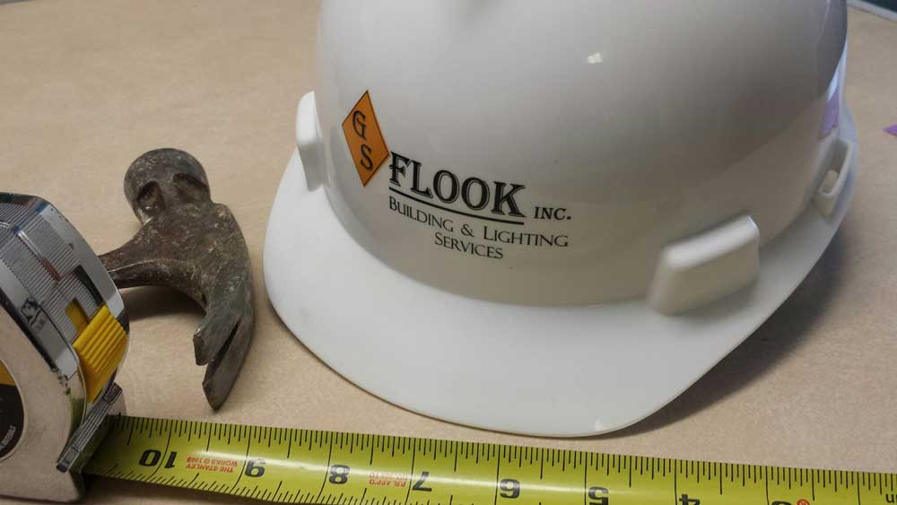 GS Flook hard hat with hammer & tape measure